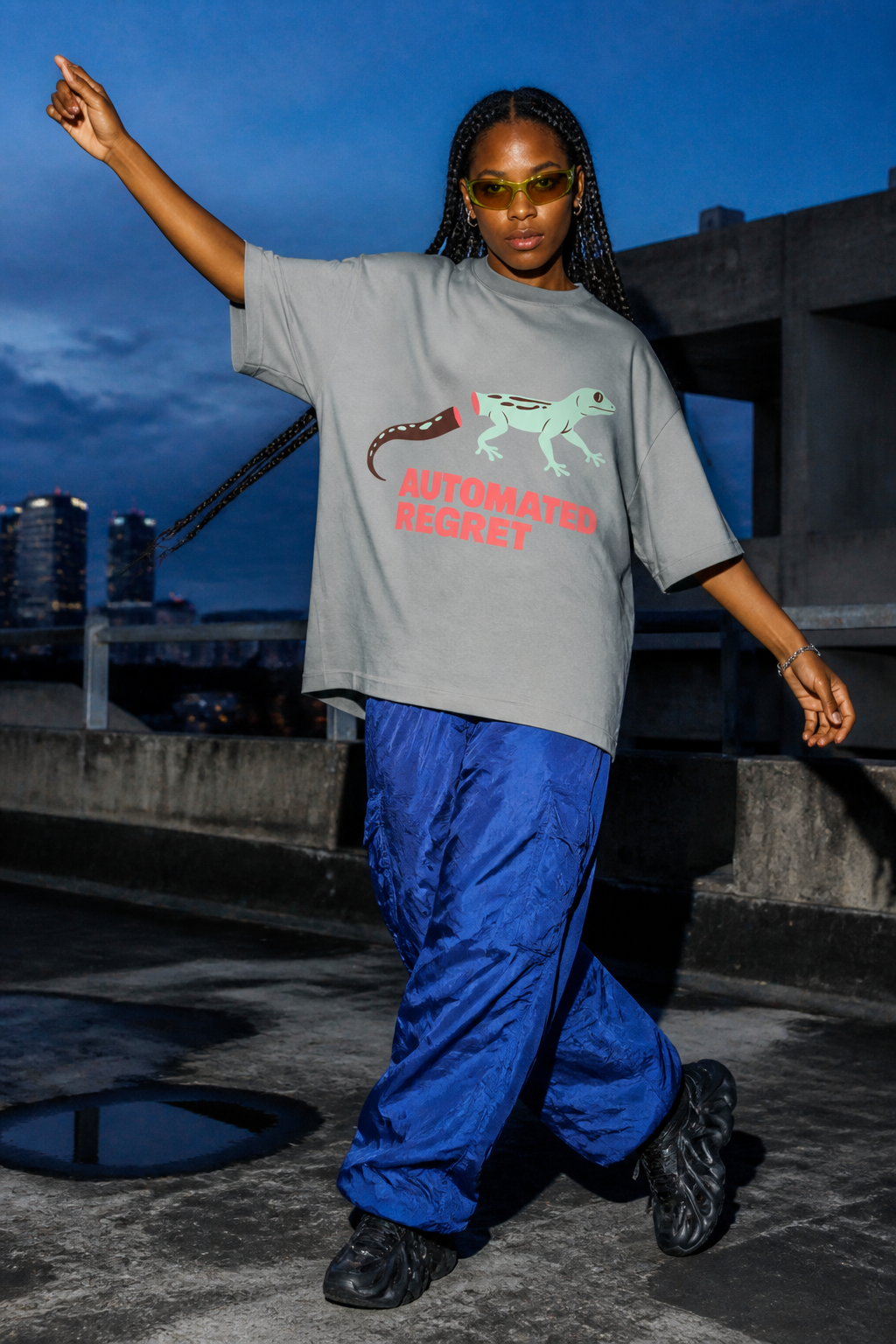 Model wearing the 3o1d AUTOMATED REGRET oversized T-shirt in Misty Grey, front graphic.