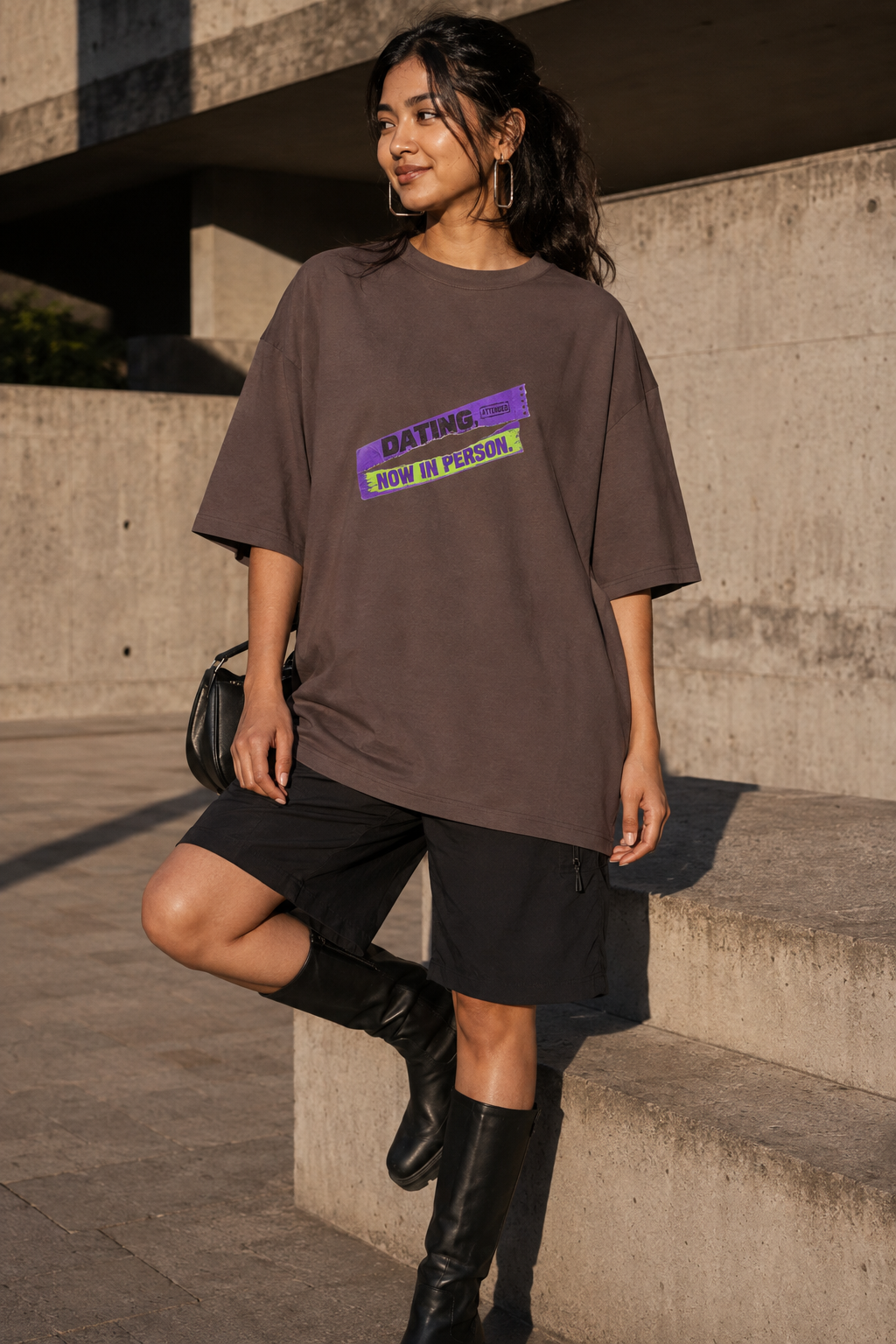 Model wearing the 3o1d DATING, NOW IN PERSON. oversized T-shirt in Mocha, front graphic.