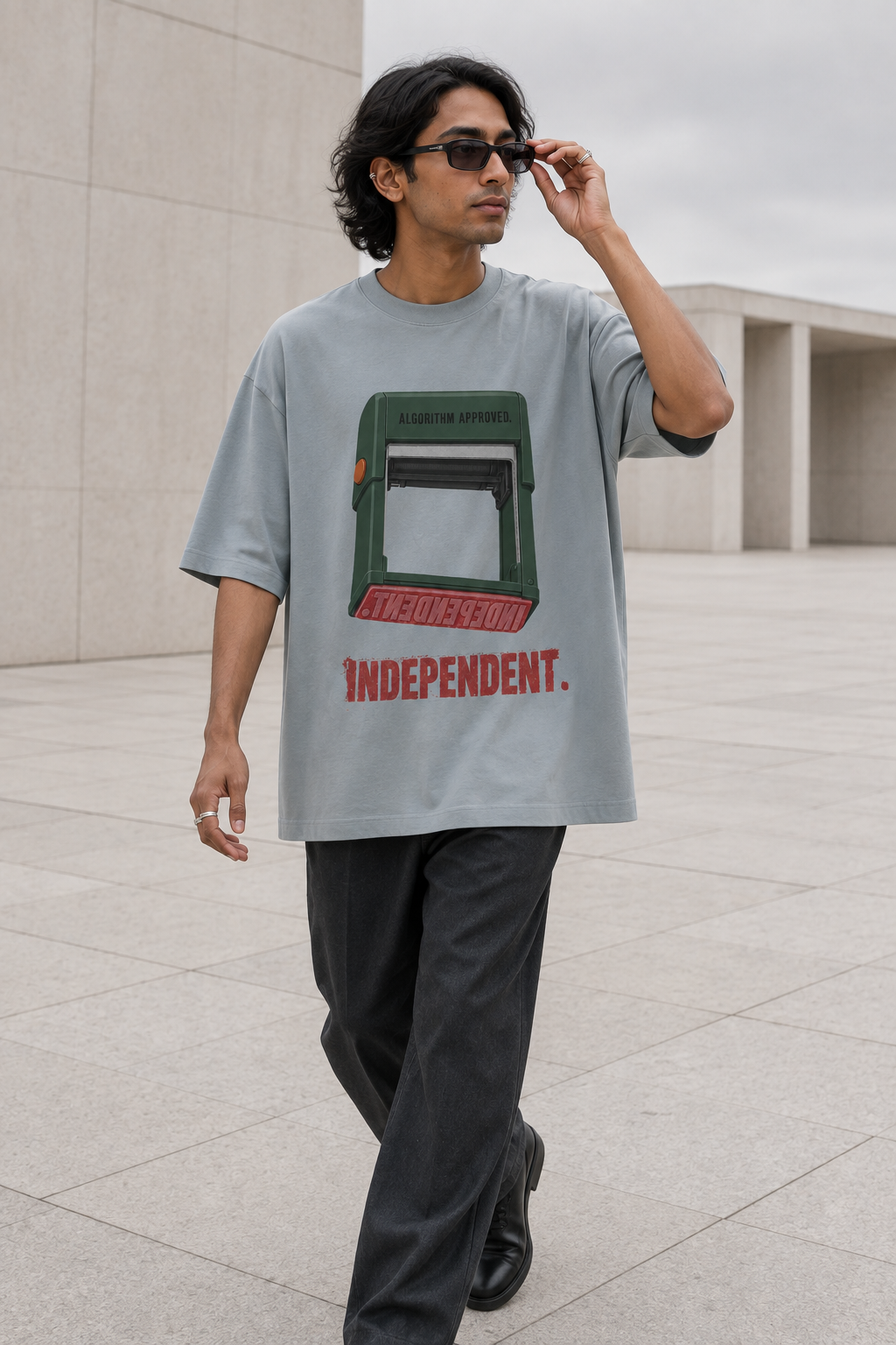 Model wearing the 3o1d INDEPENDENT. ALGORITHM APPROVED. oversized T-shirt in Misty Grey, front graphic.