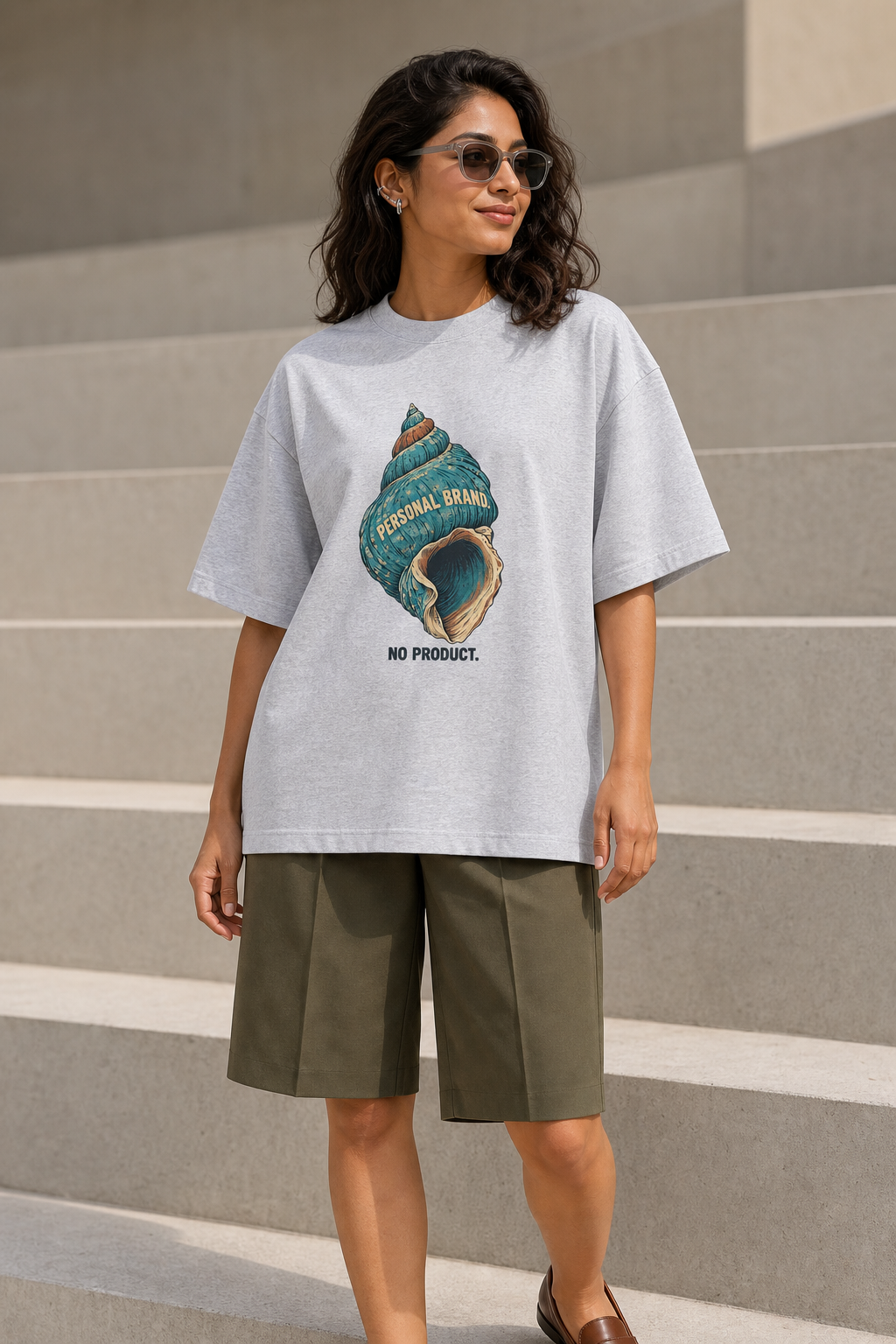 Model wearing the 3o1d PERSONAL BRAND. NO PRODUCT. oversized T-shirt in Cool Heather Grey, front graphic.