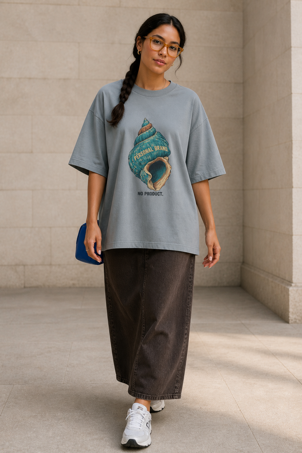 Model wearing the 3o1d PERSONAL BRAND. NO PRODUCT. oversized T-shirt in Misty Grey, front graphic.