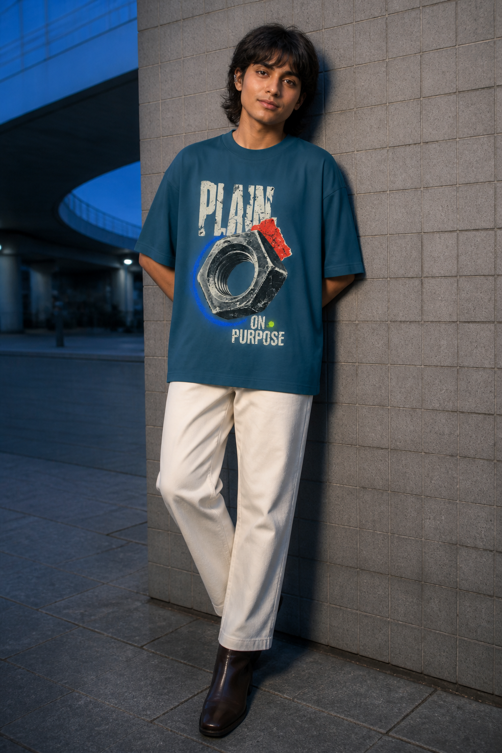 Model wearing the 3o1d PLAIN ON PURPOSE oversized T-shirt in Deep Teal, front graphic.