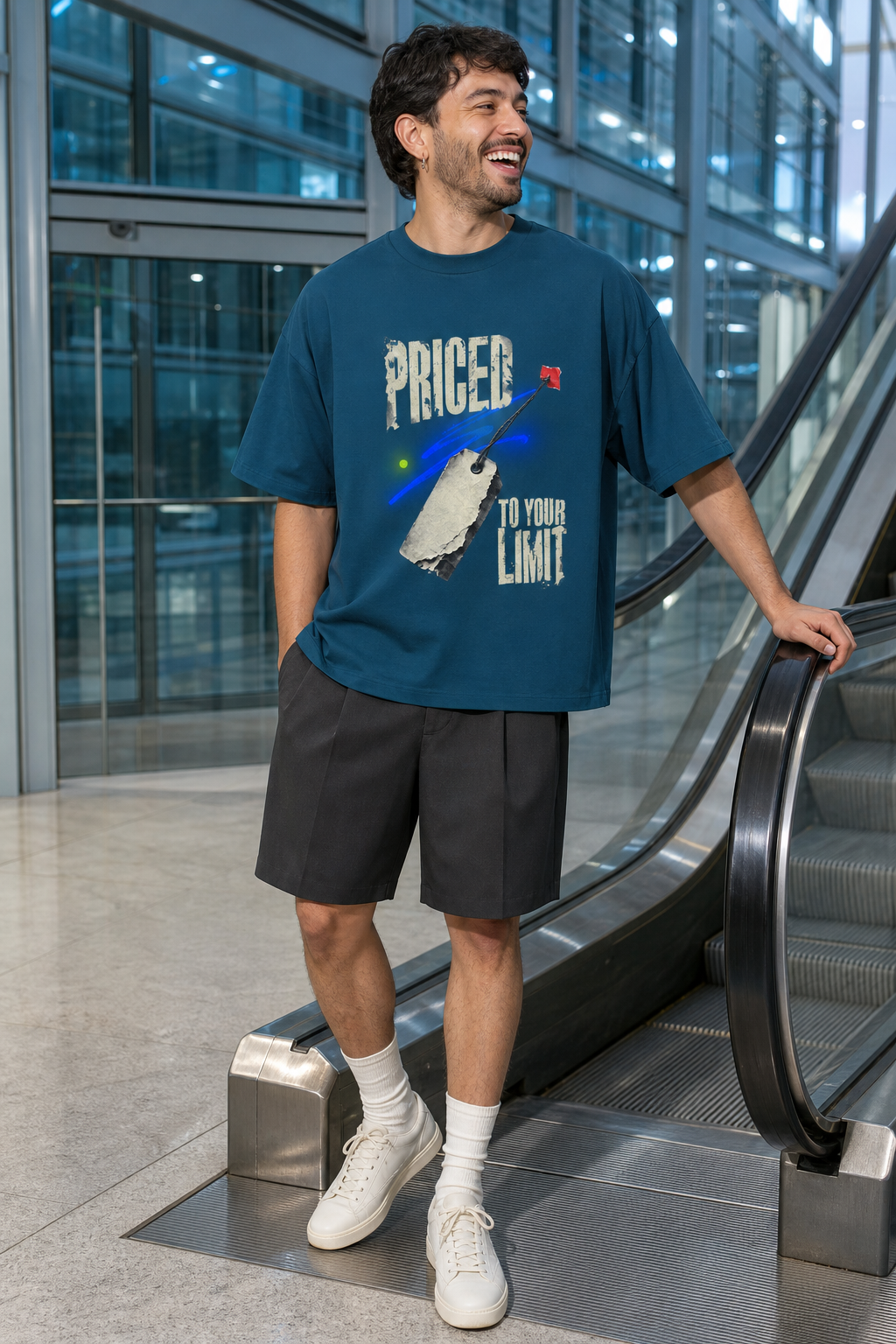 Model wearing the 3o1d PRICED TO YOUR LIMIT oversized T-shirt in Deep Teal, front graphic.