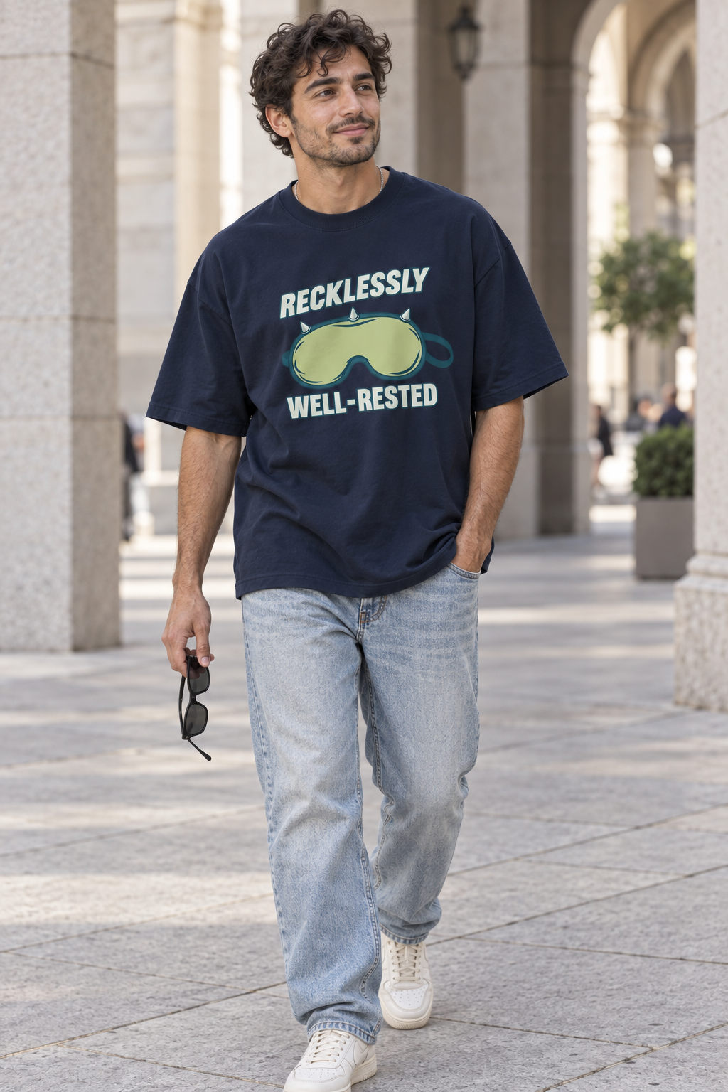 Model wearing the 3o1d RECKLESSLY WELL-RESTED oversized T-shirt in French Navy, front graphic.