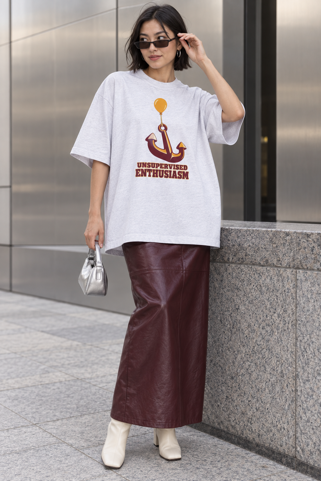 Model wearing the 3o1d UNSUPERVISED ENTHUSIASM oversized T-shirt in Cool Heather Grey, front graphic.