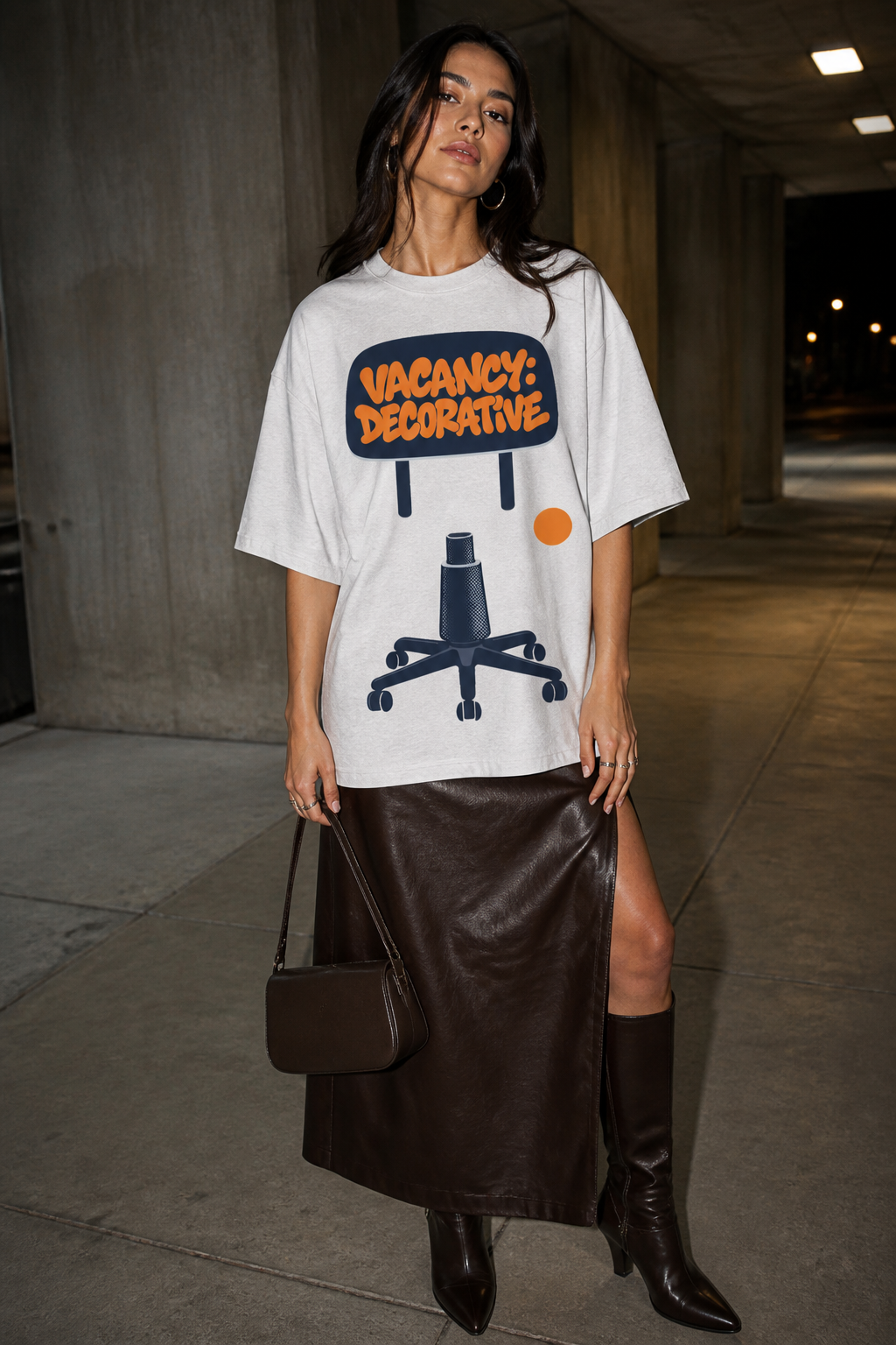 Model wearing the 3o1d VACANCY: DECORATIVE oversized T-shirt in Cool Heather Grey, front graphic.